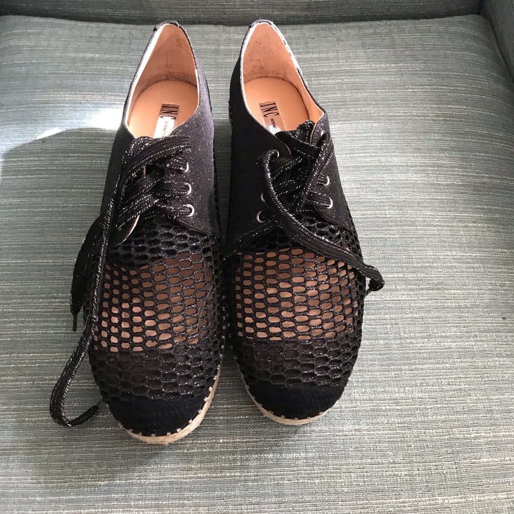 Black lace up wedges.